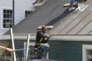 Our lead foreman Ayan Carcamo at work! - Installing a Painted 24 Gauge Steel Standing Seam Roof – Pine Plains, NY
